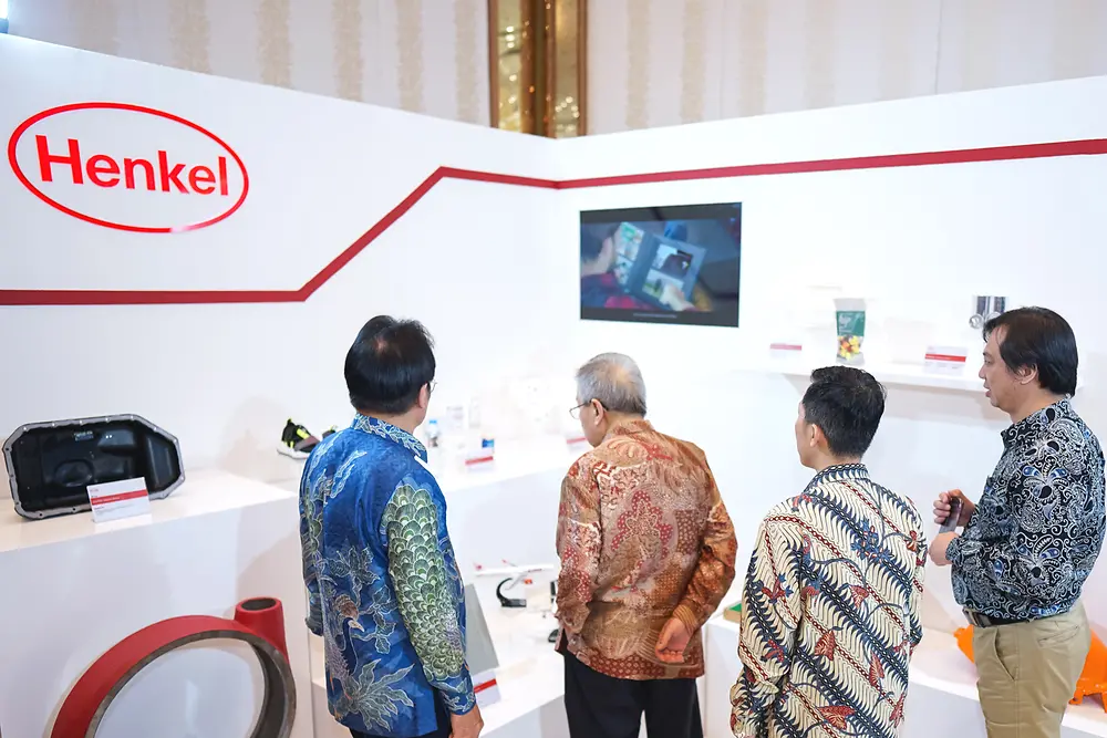 A group of people looking at a display.